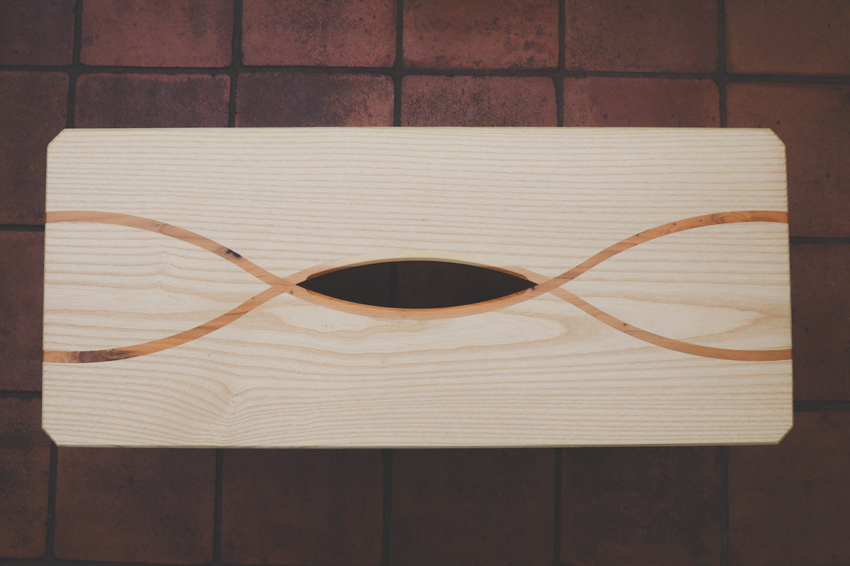 A view looking down on the Northumberland stool with the contrasting criss-cross patern running through it